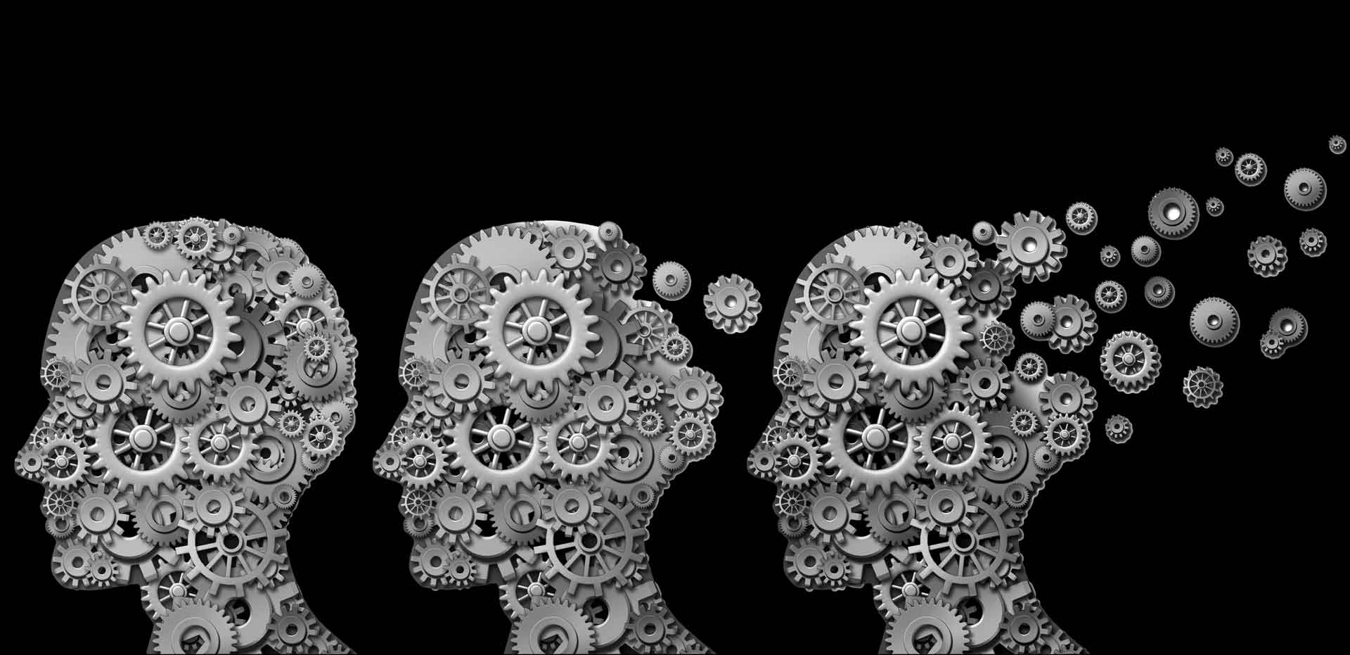 Three heads built from interlocking cogs, the cogs of the third drifting away